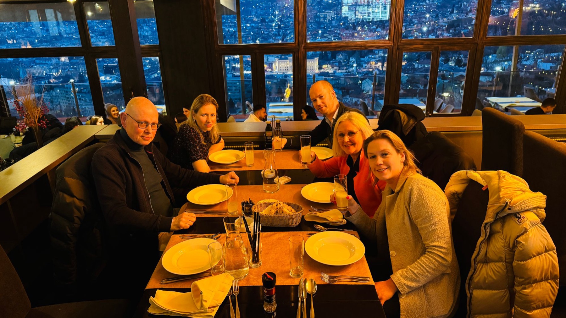 Iftar dinner with lemonade overlooking Sarajevo at night