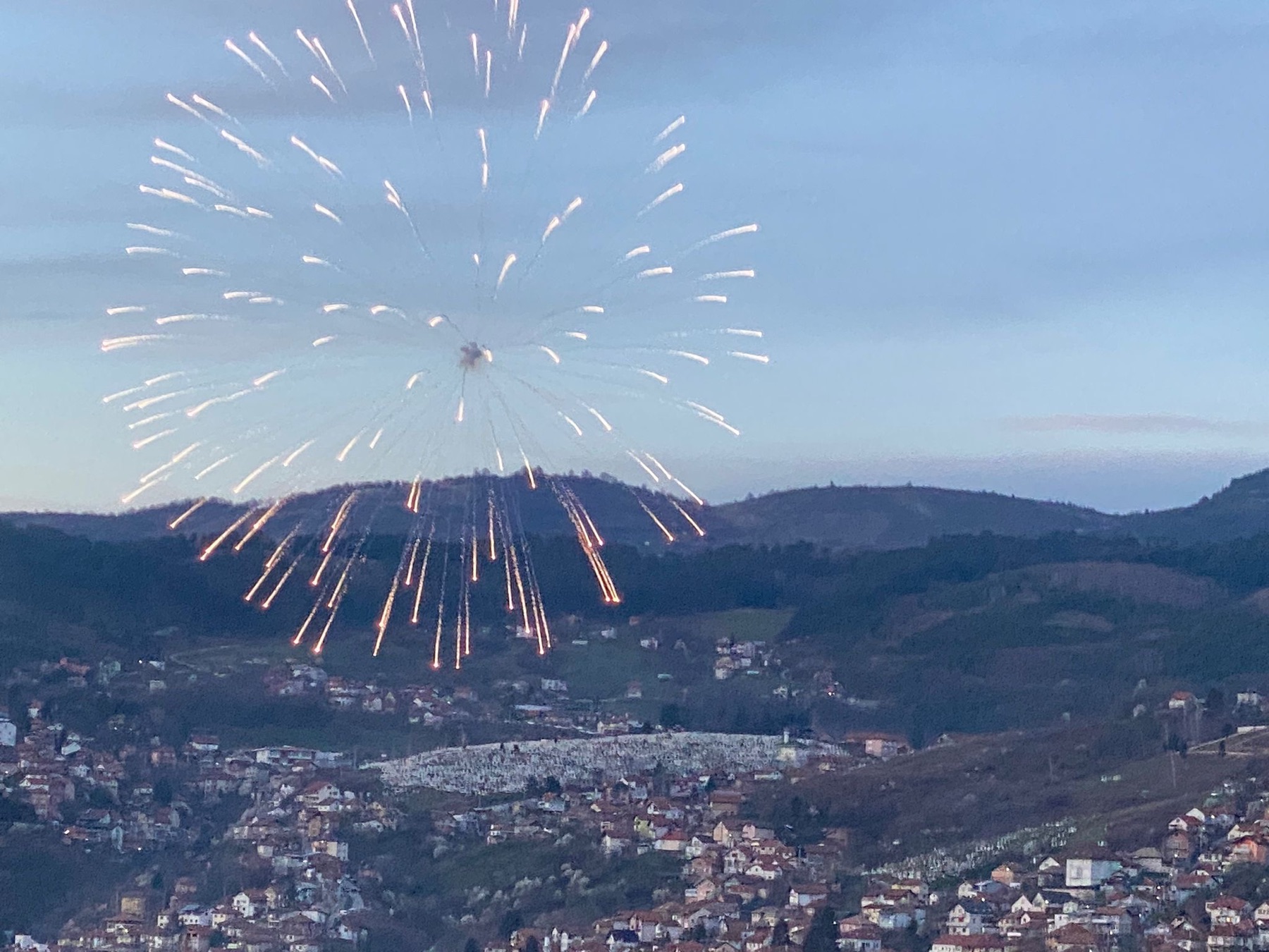 Firework over Sarajevo at iftar during Ramadan, seen from the hills
